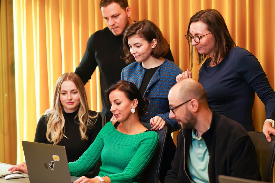 diverse group collaborating at desk