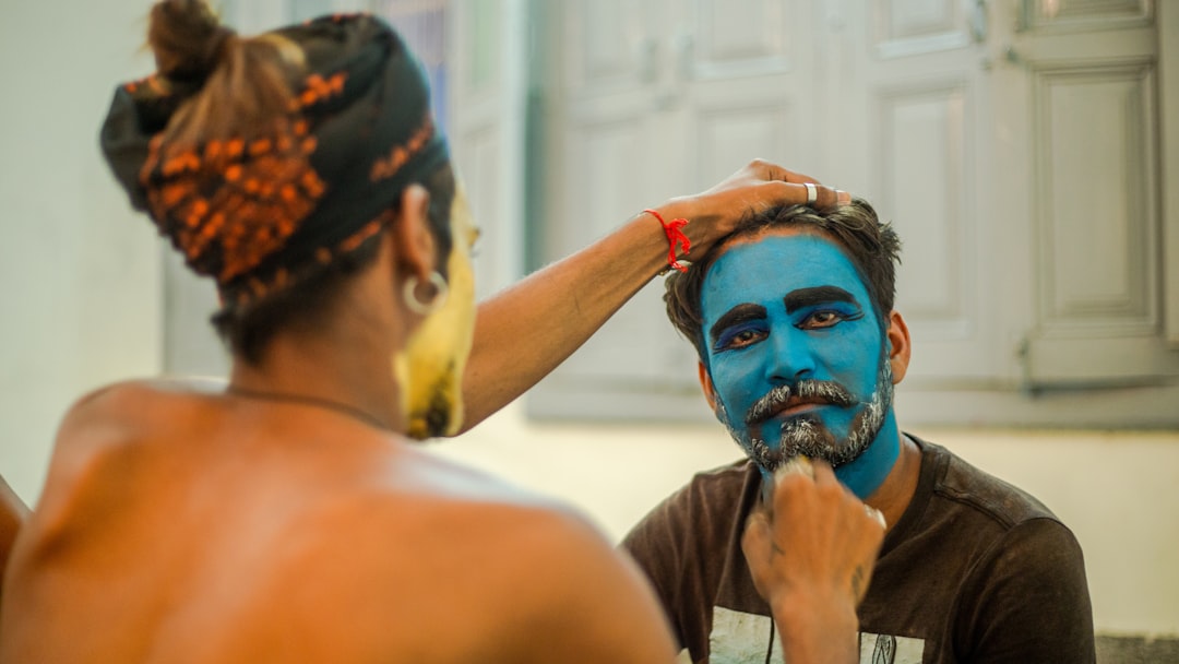 artist applying theatrical makeup