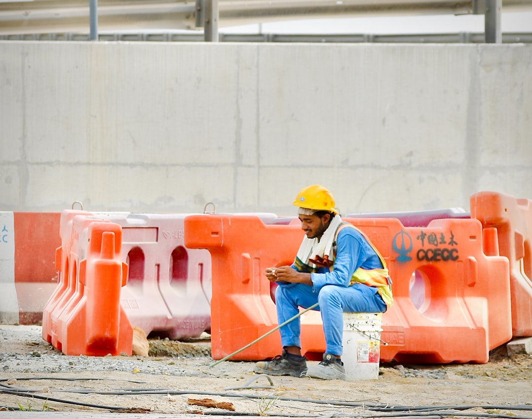 construction worker using power drill