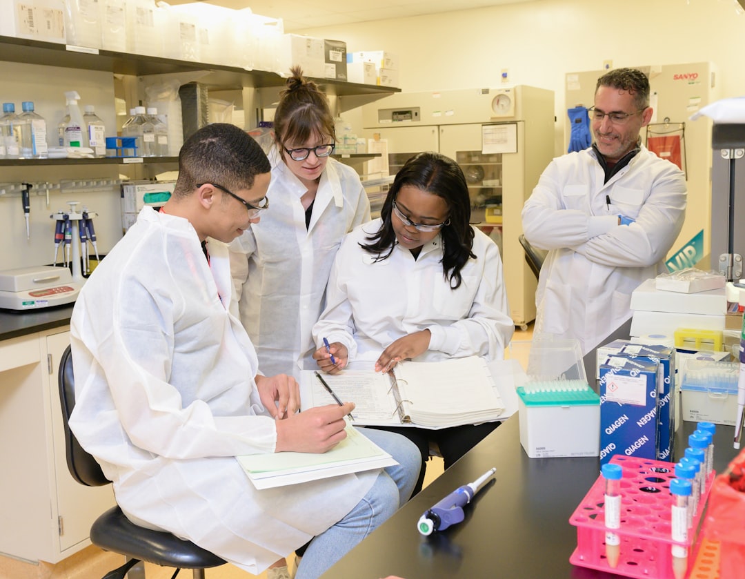 diverse professionals collaborating in lab