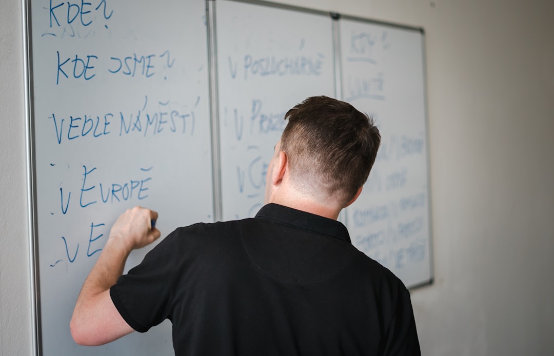 educator using whiteboard