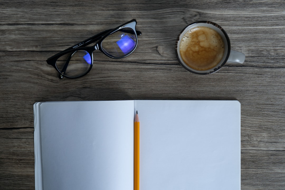 person journaling at home desk