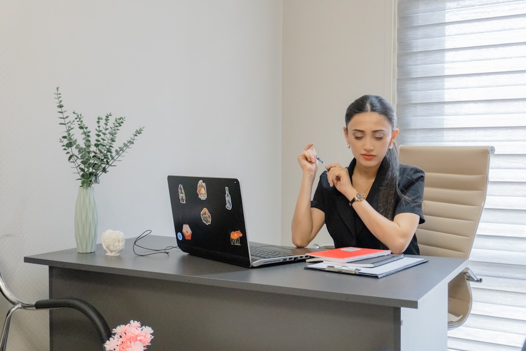 woman practicing yoga in office